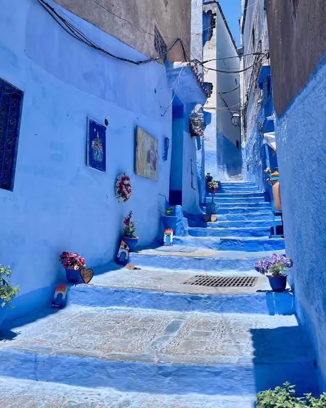 The famous blue stairway of the Chefchaouen medina
